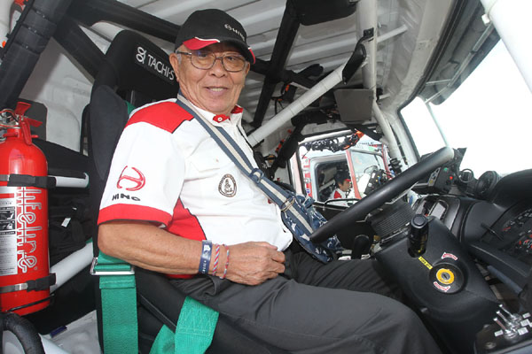 Yoshimasa Sugawara is in top physical condition and full of energy as he arrives on Car 1 at the inspection center.