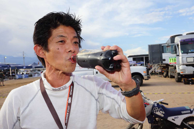 Katsumi Hamura relaxes after arriving at the bivouac.
