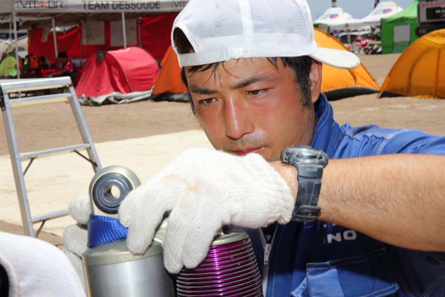 Mechanic Hironaga Hayashi replaces a shock absorber.