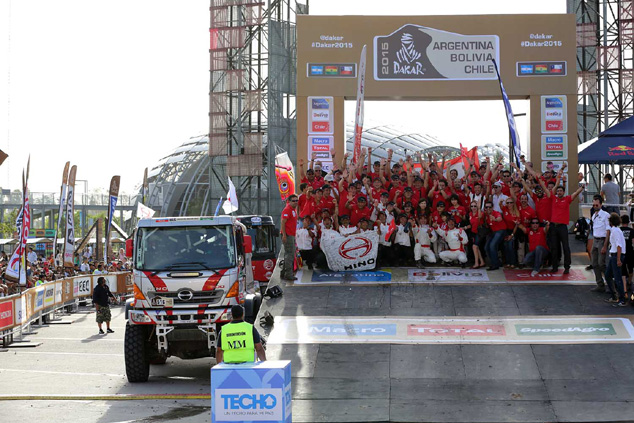 An elated Hino team with Car 2 at the podium.
