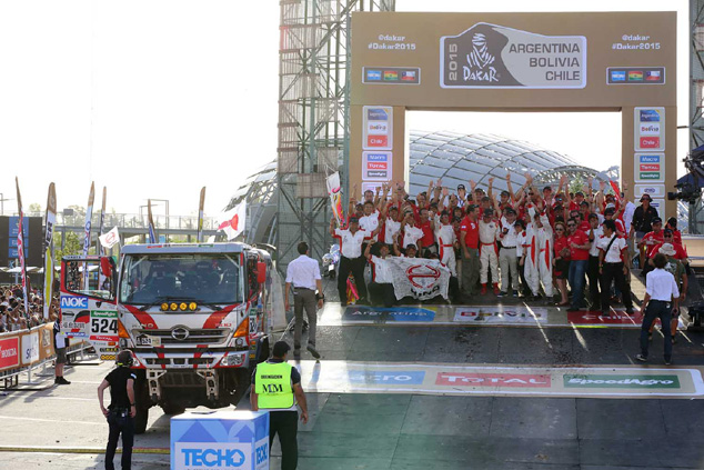 The Car 1 crew and staff members on the podium.