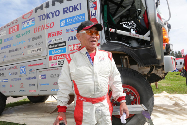 Yoshimasa Sugawara is all smiles as he arrives at Salta.