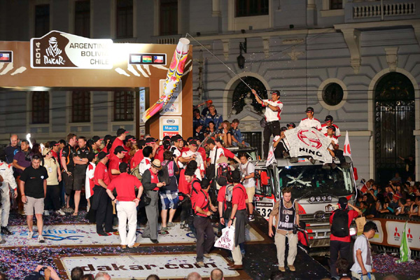 Mr. Ichikawa showers Car 1 with champagne at the podium.