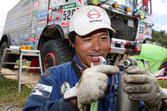 Mechanic subleader, Masaki Nakamura prepares to replace a shock absorber.